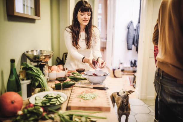 Woman making food for her dog
