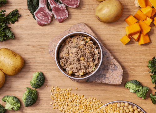 Kabo luscious lamb recipe in a bowl, surrounded by ingredients