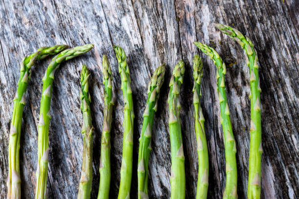 A line of asparagus on a table